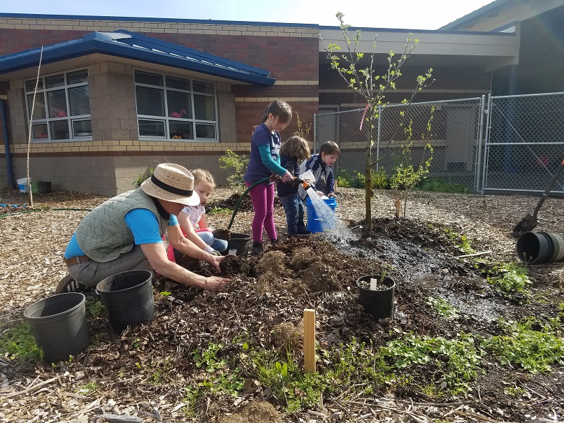 LCSG – Summertime in the Garden means lots of families help keep things watered